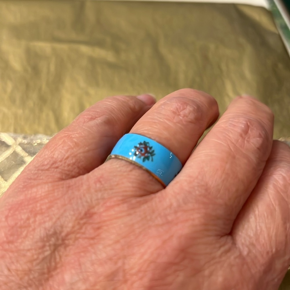 NEW: 1 Blue enameled and gold ring.